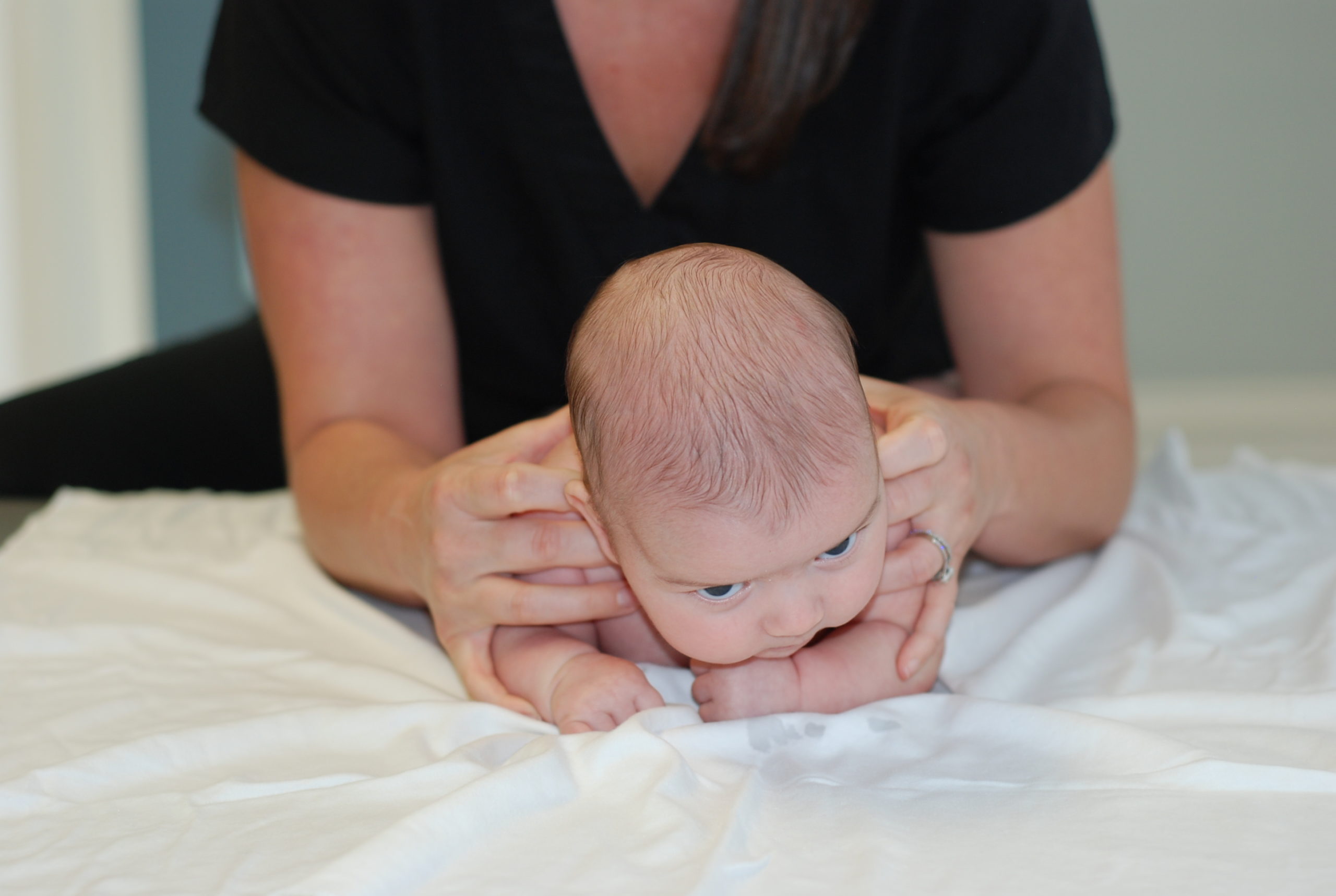 Six routines to help your newborn’s development and head shape
